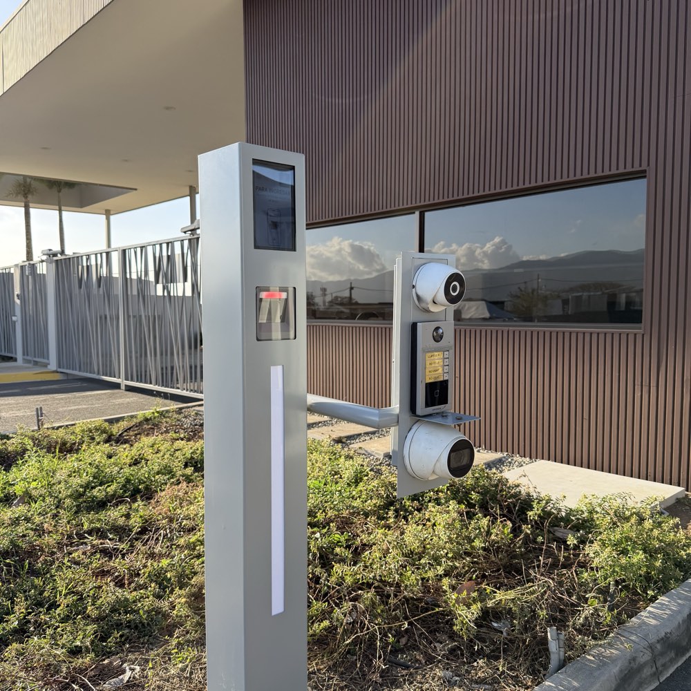 Condominium vehicle entrance with a QR and license plate reader installed